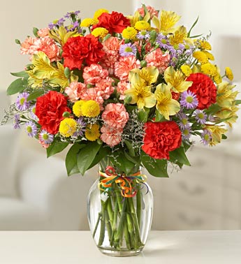 mixed carnation bouquet in glass vase