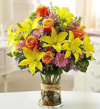 lilies, roses, daisy poms, button poms, waxflower