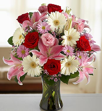 mixed bouquet in green vase